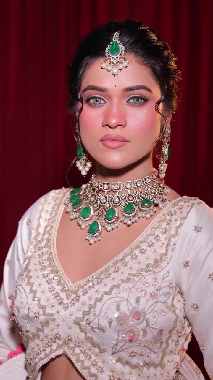 Bridal makeup look with emerald jewellery by KR Studio and Academy Gurugram